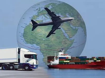 Globe with an aircraft, cargo ship and truck representing worldwide freight forwarding